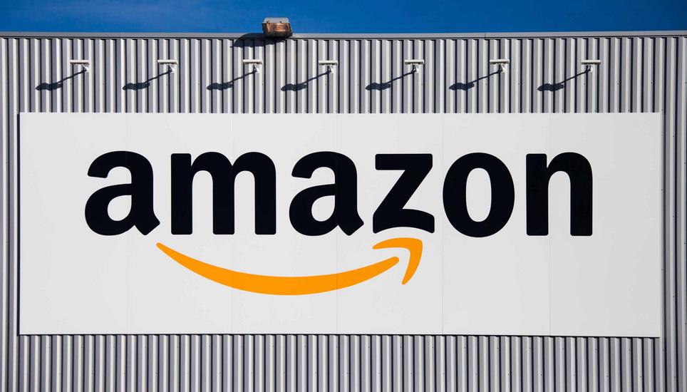 The Amazon logo is seen on the new logistics center of online merchant Amazon in Lauwin-Planque, northern France,  Thursday, Sept. 19, 2013. Amazon France plans to create 2500 jobs by 2015 in this center. (AP Photo/Michel Spingler)