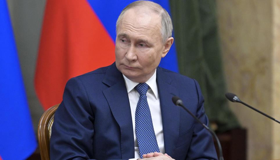 Russian President Vladimir Putin attends a meeting with Cabinet members in Moscow, Russia, Monday, May 6, 2024. Putin thanked Cabinet ministers for their work ahead of his inauguration Tuesday. (Alexander Astafyev, Sputnik, Government Pool Photo via AP)